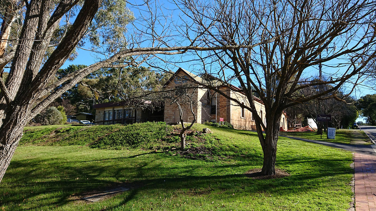 Community hall, lawn area and trees